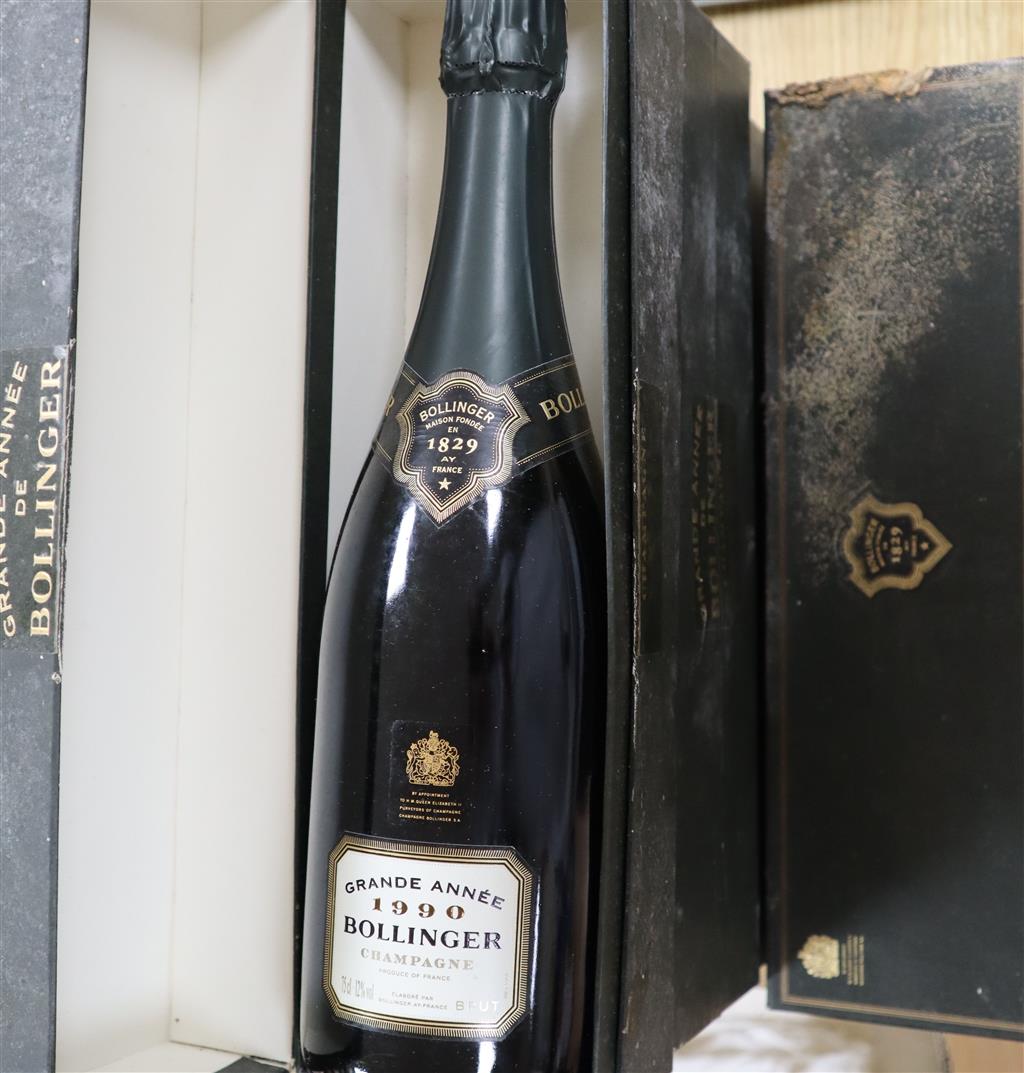 Four bottles of Bollinger Grande Annee 1990 champagne, boxed